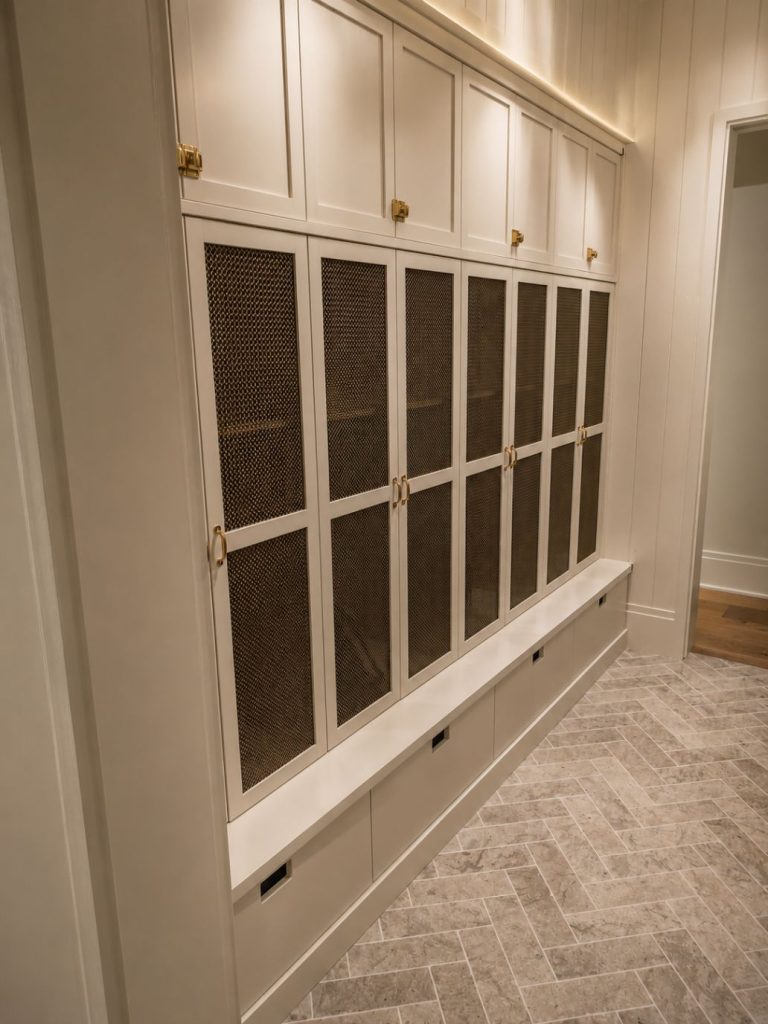 white custom hallway cabinets with built in drawers and doors.