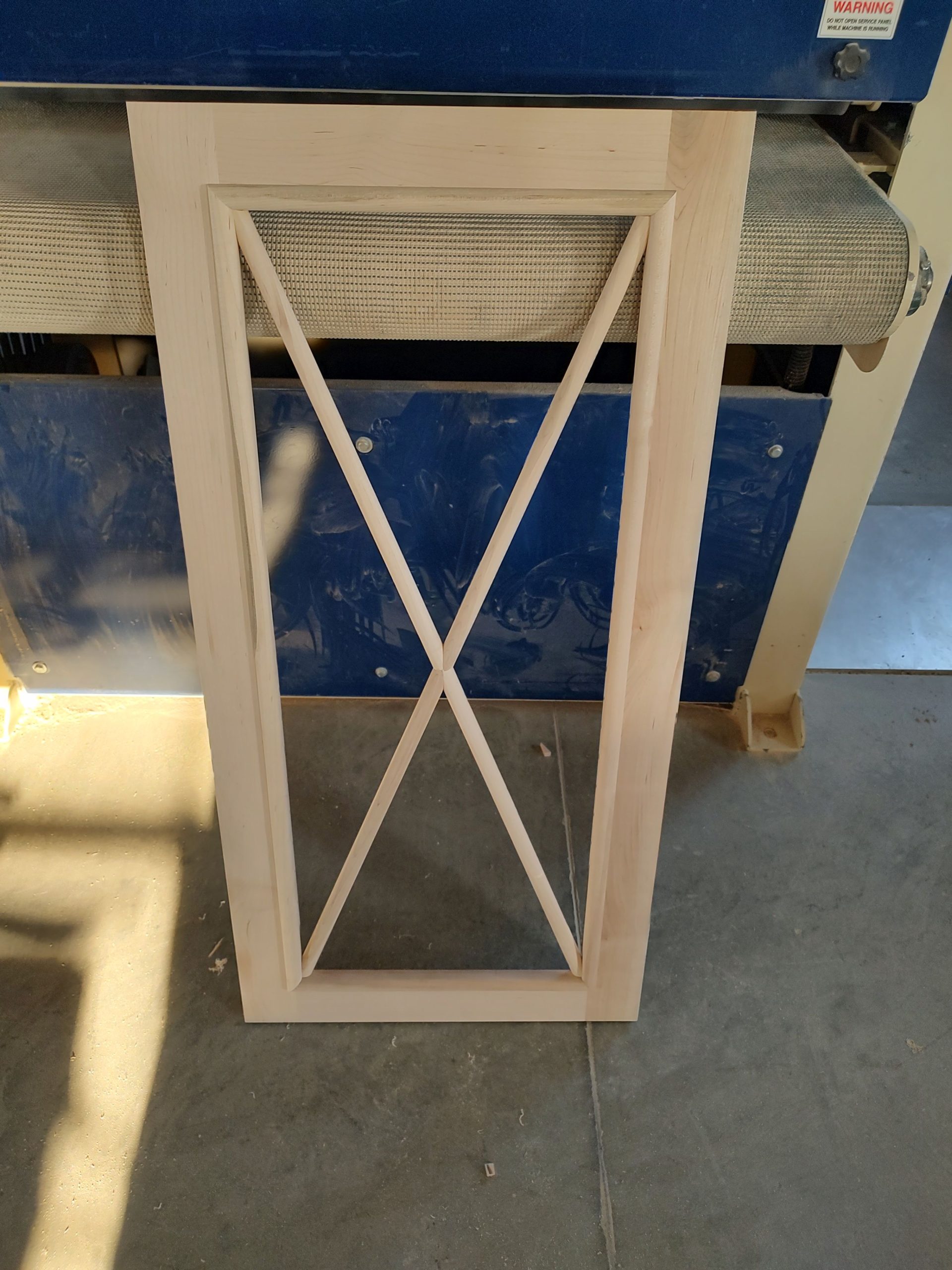 custom light wood cabinet door with diamond shapes